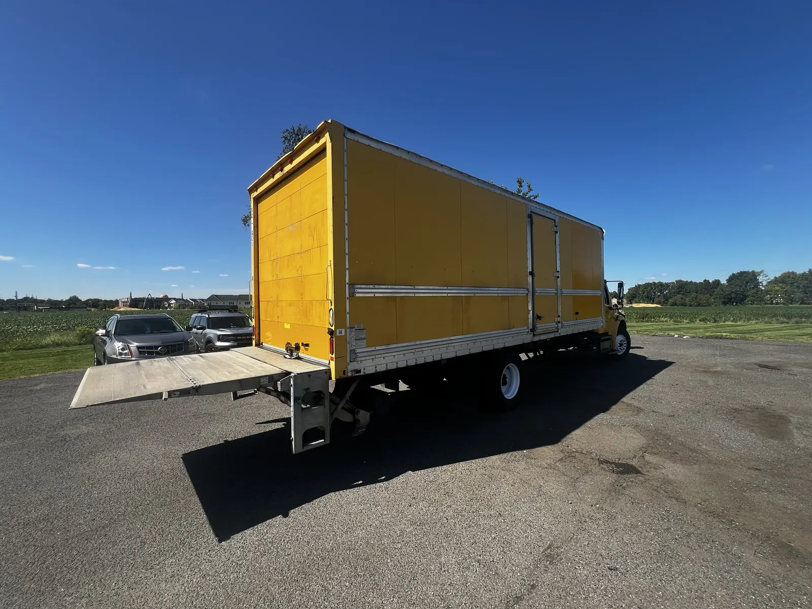 26 ft box truck with its liftgate lowered